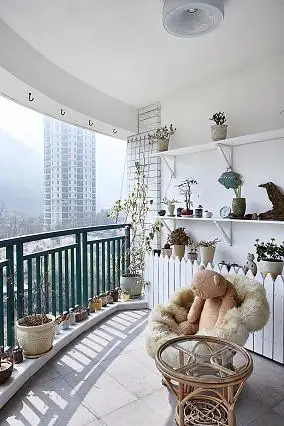 阳台1装修效果图她的家珍藏一万本书,满是书架与