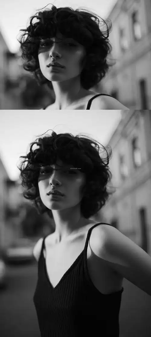 穿着吊带衣服的卷发美女模特黑白照片素材 - 超清单图