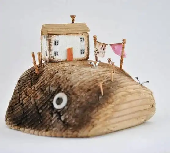 创意diy:用废弃的木头给你造一座海上"小木屋"