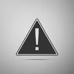 警示感叹号在灰色背景上隔离的三角形图标中的感叹号.