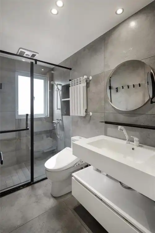 搭配粉墨色布艺沙发,一个斗柜,整个地面一体的艺术地坪漆,带来的是一