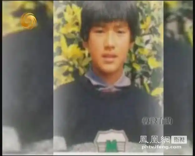 图为金城武童年时的照片.