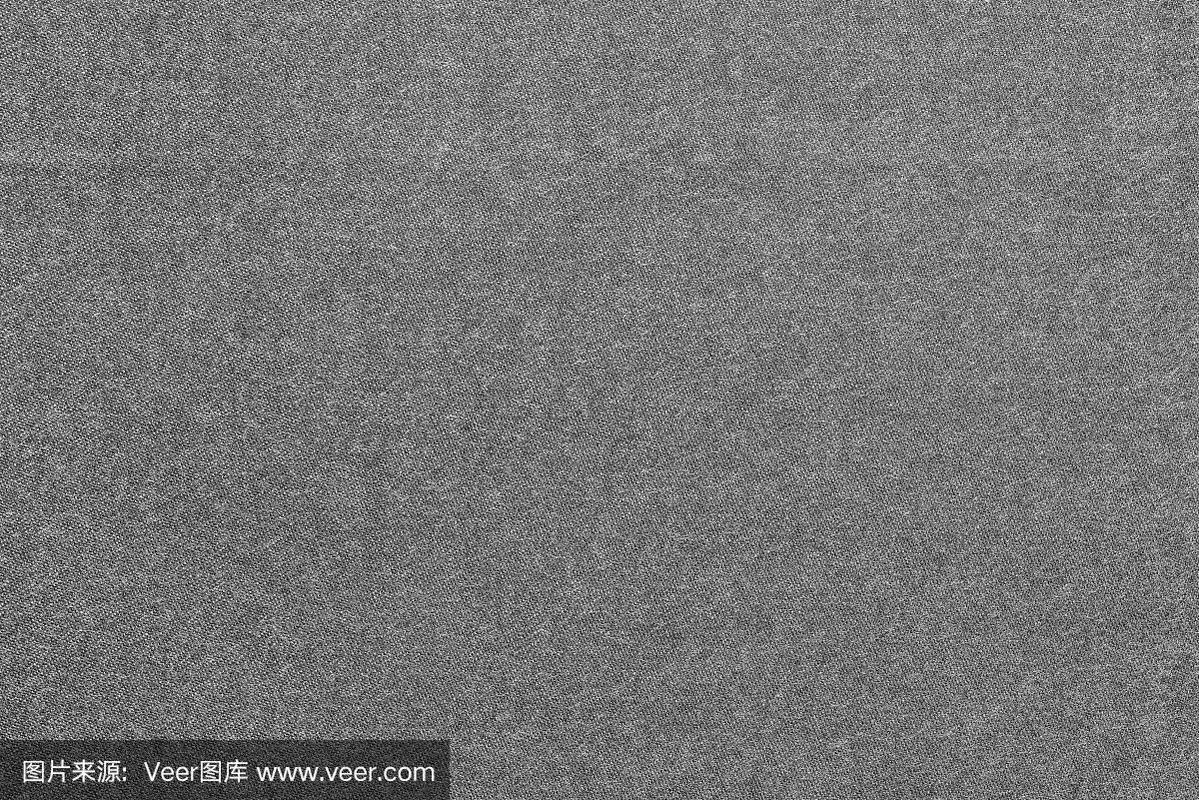 单色斑点纹理背景从织物的深灰色颜色